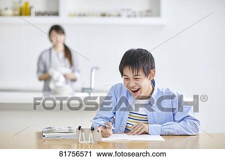 Japanese kid studying at home View Large Photo Image Stock Image - Japanese kid studying at home. Fotosearch