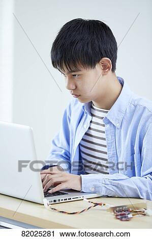 Japanese kid studying at home View Large Photo Image Stock Image - Japanese kid studying at home. Fotosearch