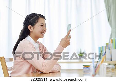 Japanese kid studying at home View Large Photo Image Stock Image - Japanese kid studying at home. Fotosearch