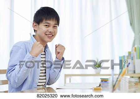 Japanese kid studying at home View Large Photo Image Stock Image - Japanese kid studying at home. Fotosearch