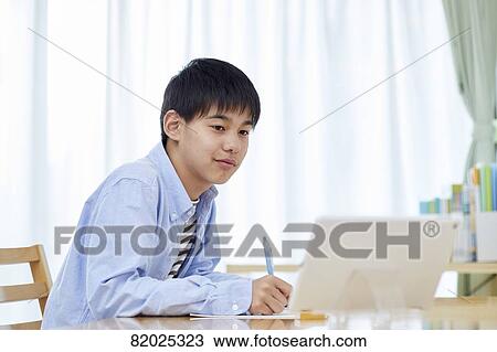 Japanese kid studying at home View Large Photo Image Stock Image - Japanese kid studying at home. Fotosearch