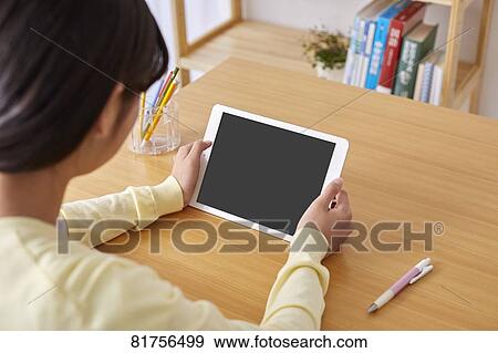 Japanese kid studying at home View Large Photo Image Stock Photo - Japanese kid studying at home. Fotosearch