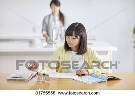 Japanese kid studying at home View Large Photo Image Stock Photo - Japanese kid studying at home. Fotosearch