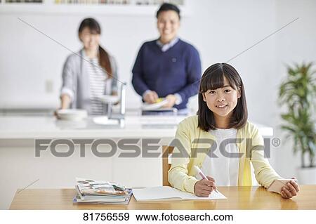 Japanese kid studying at home View Large Photo Image Stock Photo - Japanese kid studying at home. Fotosearch
