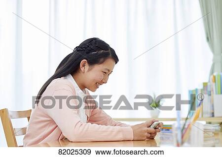 Japanese kid studying at home View Large Photo Image Stock Photo - Japanese kid studying at home. Fotosearch