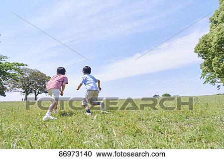 Japanese kids in a city park View Large Photo Image Stock Image - Japanese kids in a city park. Fotosearch