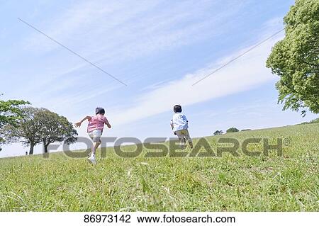 Japanese kids in a city park View Large Photo Image Stock Image - Japanese kids in a city park. Fotosearch