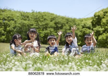 Japanese kids in a city park View Large Photo Image Stock Photo - Japanese kids in a city park. Fotosearch