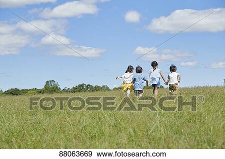Japanese kids in a city park View Large Photo Image Stock Photo - Japanese kids in a city park. Fotosearch