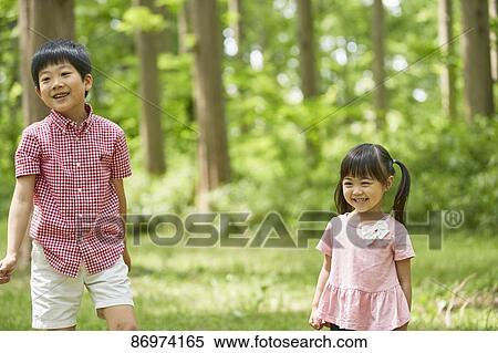 Japanese kids in a city park View Large Photo Image Stock Photography - Japanese kids in a city park. Fotosearch