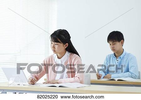 Stock Image - Japanese kids studying. Fotosearch