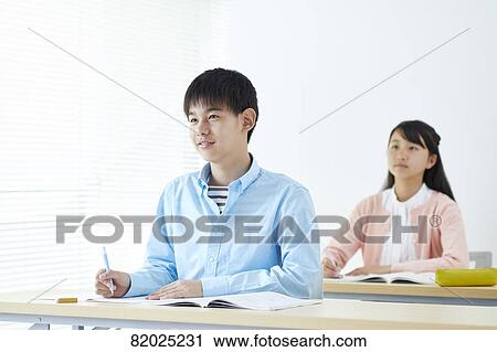 Stock Image - Japanese kids studying. Fotosearch