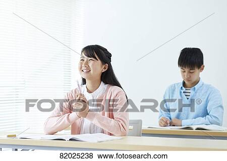 Stock Photo - Japanese kids studying. Fotosearch