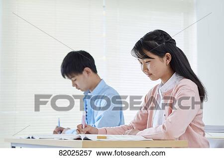 Stock Photo - Japanese kids studying. Fotosearch