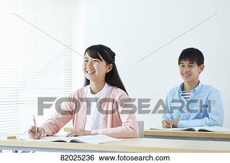 Stock Photograph - Japanese kids studying. Fotosearch