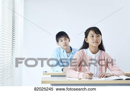 Stock Photography - Japanese kids studying. Fotosearch