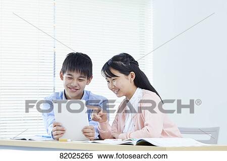 Stock Photography - Japanese kids studying. Fotosearch