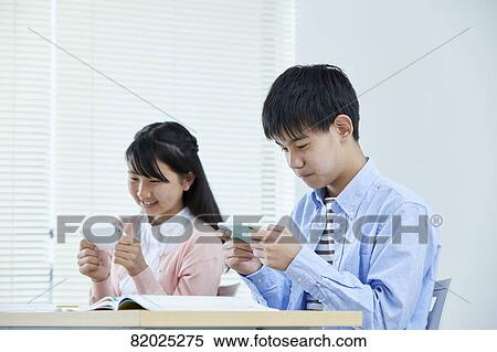 Stock Photography - Japanese kids studying. Fotosearch