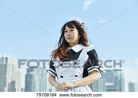 Japanese maid cosplay View Large Photo Image Picture - Japanese maid cosplay. Fotosearch
