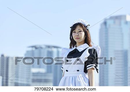 Japanese maid cosplay View Large Photo Image Picture - Japanese maid cosplay. Fotosearch