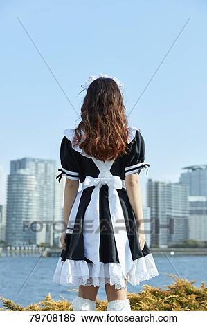 Stock Photograph - Japanese maid cosplay. Fotosearch