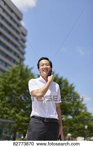 Stock Image - Japanese man in the hot weather. Fotosearch