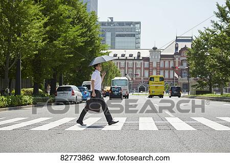 Japanese man with parasol View Large Photo Image Stock Image - Japanese man with parasol. Fotosearch
