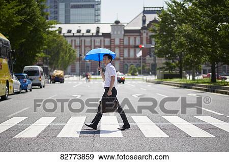 Japanese man with parasol View Large Photo Image Stock Photo - Japanese man with parasol. Fotosearch