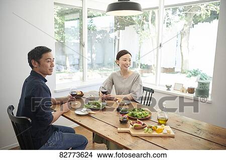 Japanese mature couple eating View Large Photo Image Picture - Japanese mature couple eating. Fotosearch