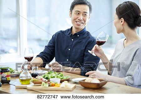 Japanese mature couple eating View Large Photo Image Stock Photo - Japanese mature couple eating. Fotosearch