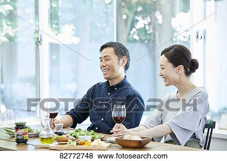 Japanese mature couple eating View Large Photo Image Stock Photo - Japanese mature couple eating. Fotosearch