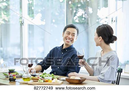 Stock Photo - Japanese mature couple eating. Fotosearch