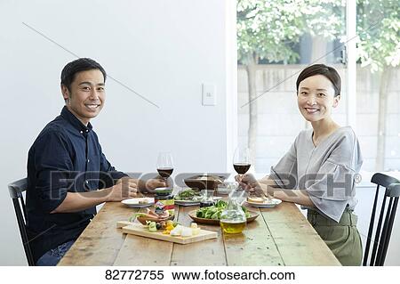 Stock Photography - Japanese mature couple eating. Fotosearch