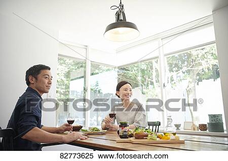 Japanese mature couple eating View Large Photo Image Stock Photography - Japanese mature couple eating. Fotosearch
