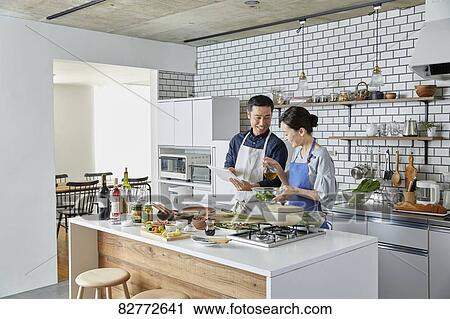 Japanese mature couple in the kitchen View Large Photo Image Stock Image - Japanese mature couple in the kitchen. Fotosearch