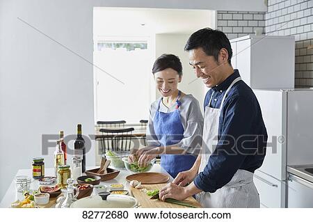 Japanese mature couple in the kitchen View Large Photo Image Stock Image - Japanese mature couple in the kitchen. Fotosearch