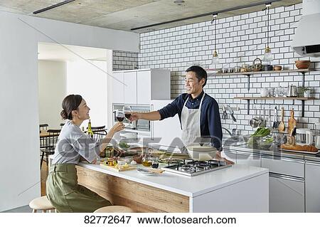 Japanese mature couple in the kitchen View Large Photo Image Stock Photo - Japanese mature couple in the kitchen. Fotosearch