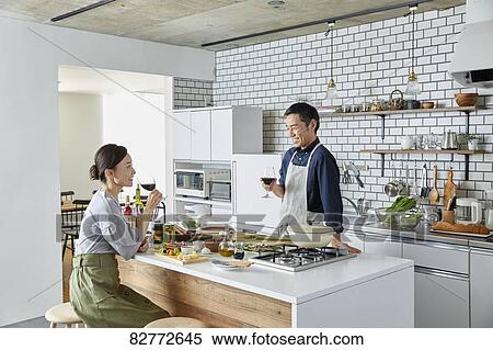 Japanese mature couple in the kitchen View Large Photo Image Stock Photography - Japanese mature couple in the kitchen. Fotosearch