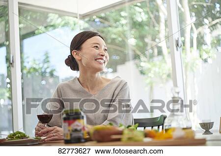 Stock Photo - Japanese mature man dining. Fotosearch