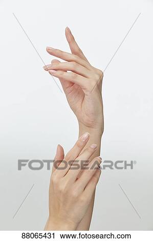 Stock Image - Japanese model hands. Fotosearch