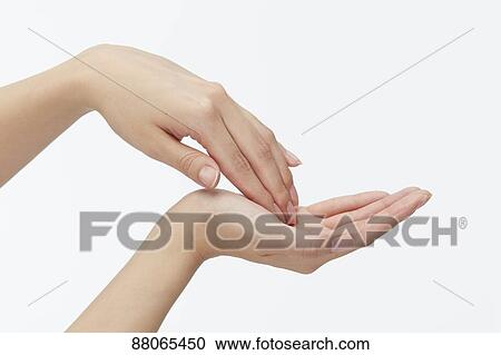 Stock Image - Japanese model hands. Fotosearch