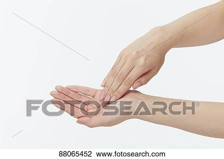 Stock Image - Japanese model hands. Fotosearch