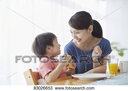 Japanese mother and kid having breakfast View Large Photo Image Stock Image - Japanese mother and kid having breakfast. Fotosearch