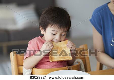 Japanese mother and kid having breakfast View Large Photo Image Stock Image - Japanese mother and kid having breakfast. Fotosearch