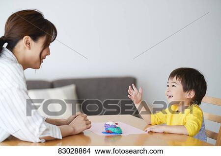 Japanese mother and kid playing View Large Photo Image Picture - Japanese mother and kid playing. Fotosearch