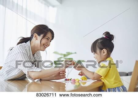Japanese mother and kid playing View Large Photo Image Stock Image - Japanese mother and kid playing. Fotosearch