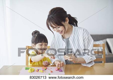 Japanese mother and kid playing View Large Photo Image Stock Image - Japanese mother and kid playing. Fotosearch