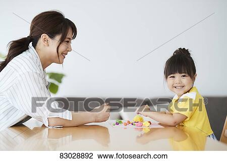 Japanese mother and kid playing View Large Photo Image Stock Image - Japanese mother and kid playing. Fotosearch