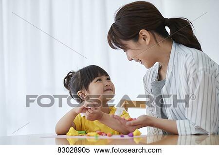 Japanese mother and kid playing View Large Photo Image Stock Photography - Japanese mother and kid playing. Fotosearch