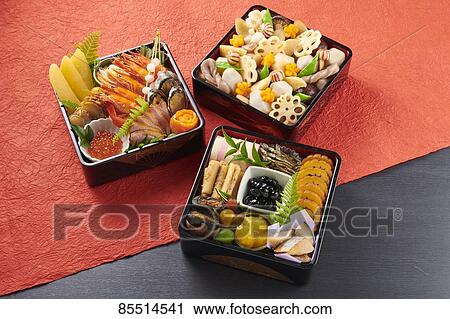 Stock Image - Japanese New Year traditional Osechi dishes. Fotosearch